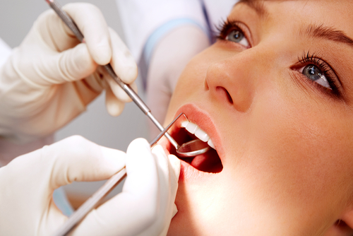 woman having dental checkup, dentist, dental work